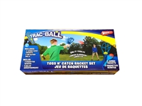 Wham-O Trac Ball package with two kids playing with the trac ball set. The kid in green is launching a trac ball towards the kid in blue. On package includes a picture of all contents in set. Two Trac Ball racquets & two trac balls.